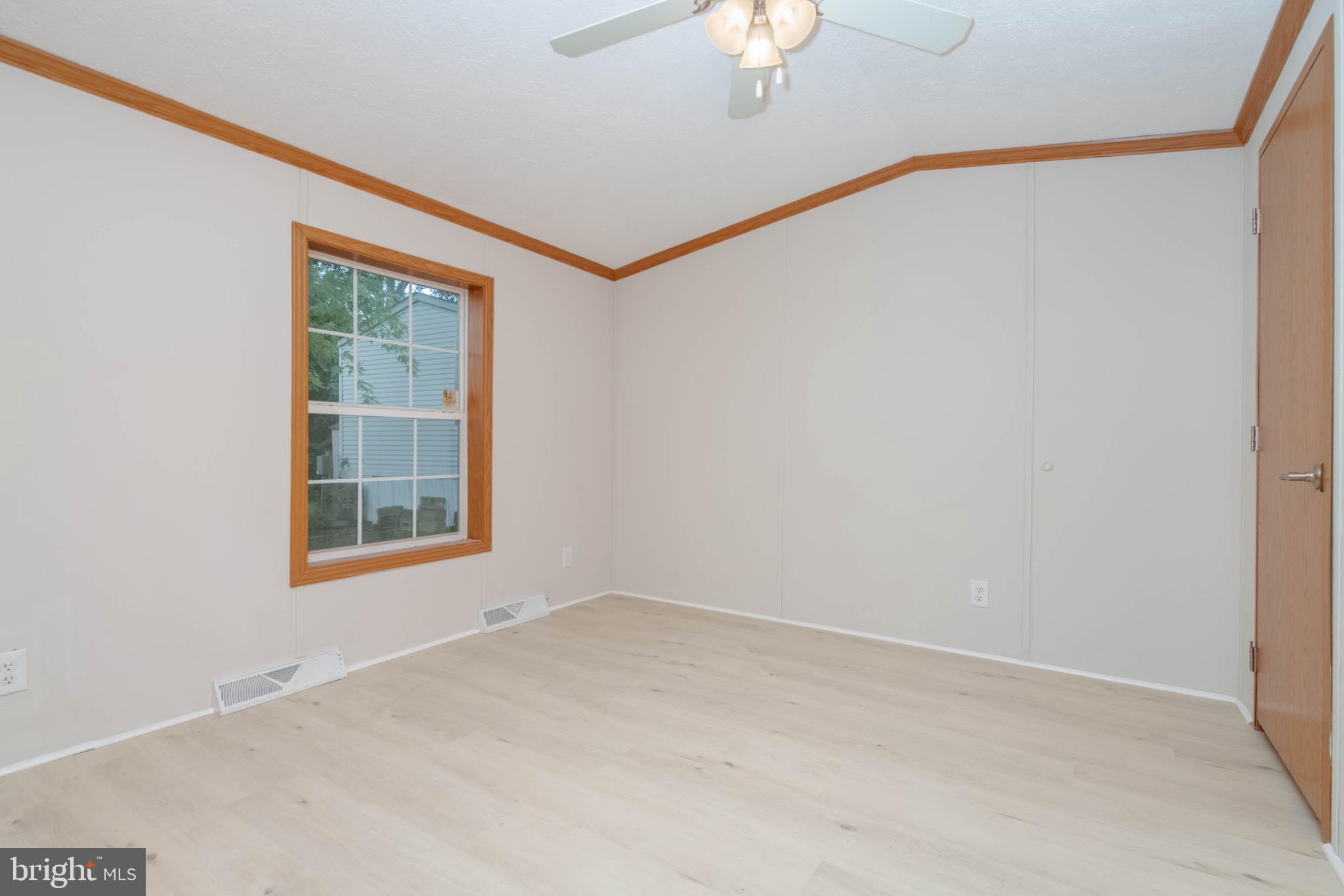 11540 Philadelphia Road White Marsh, MD 21162 - Photo 17 of 32 an empty room with a window