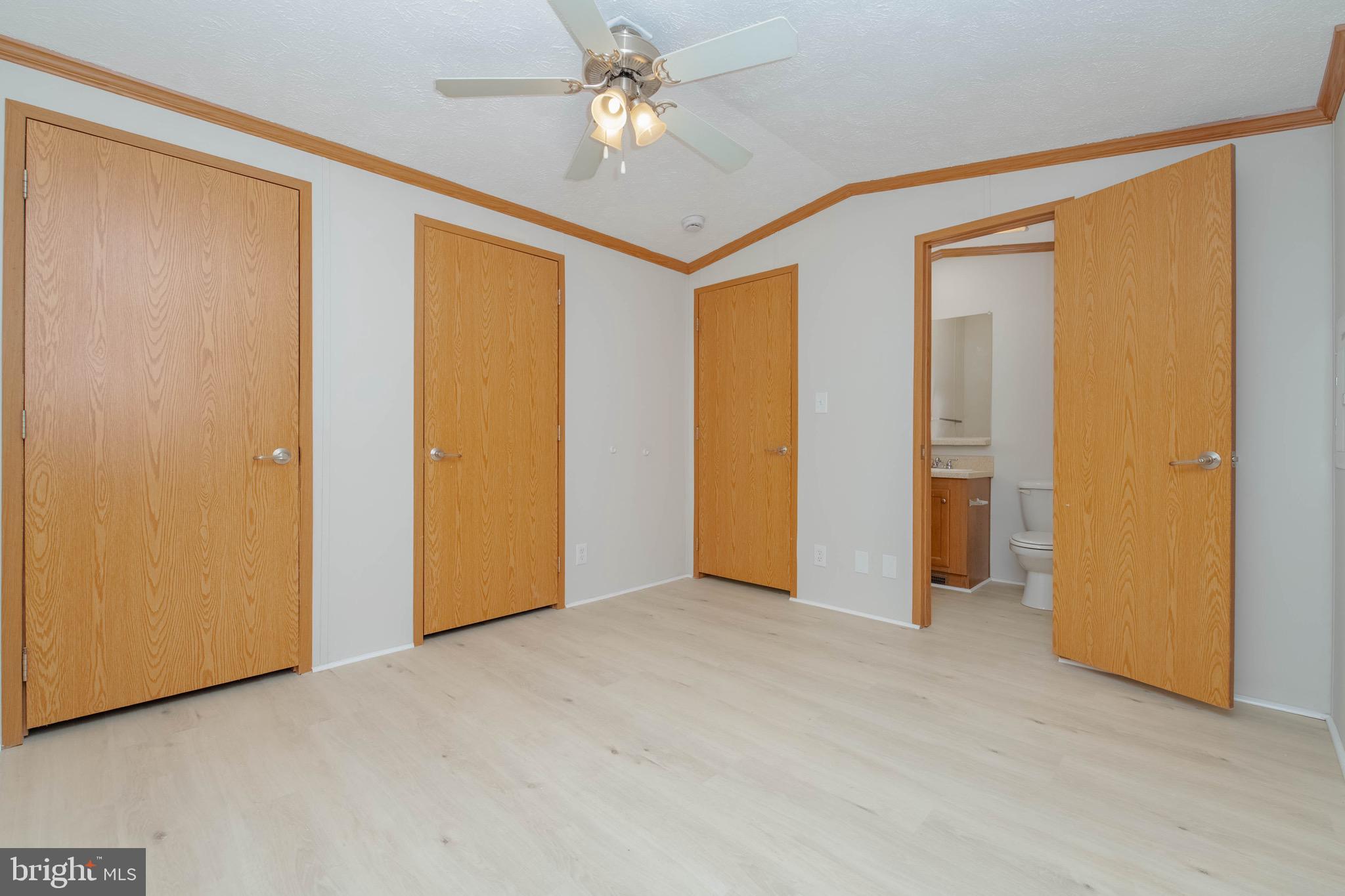 11540 Philadelphia Road White Marsh, MD 21162 - Photo 19 of 32 a view of empty room with a ceiling fan