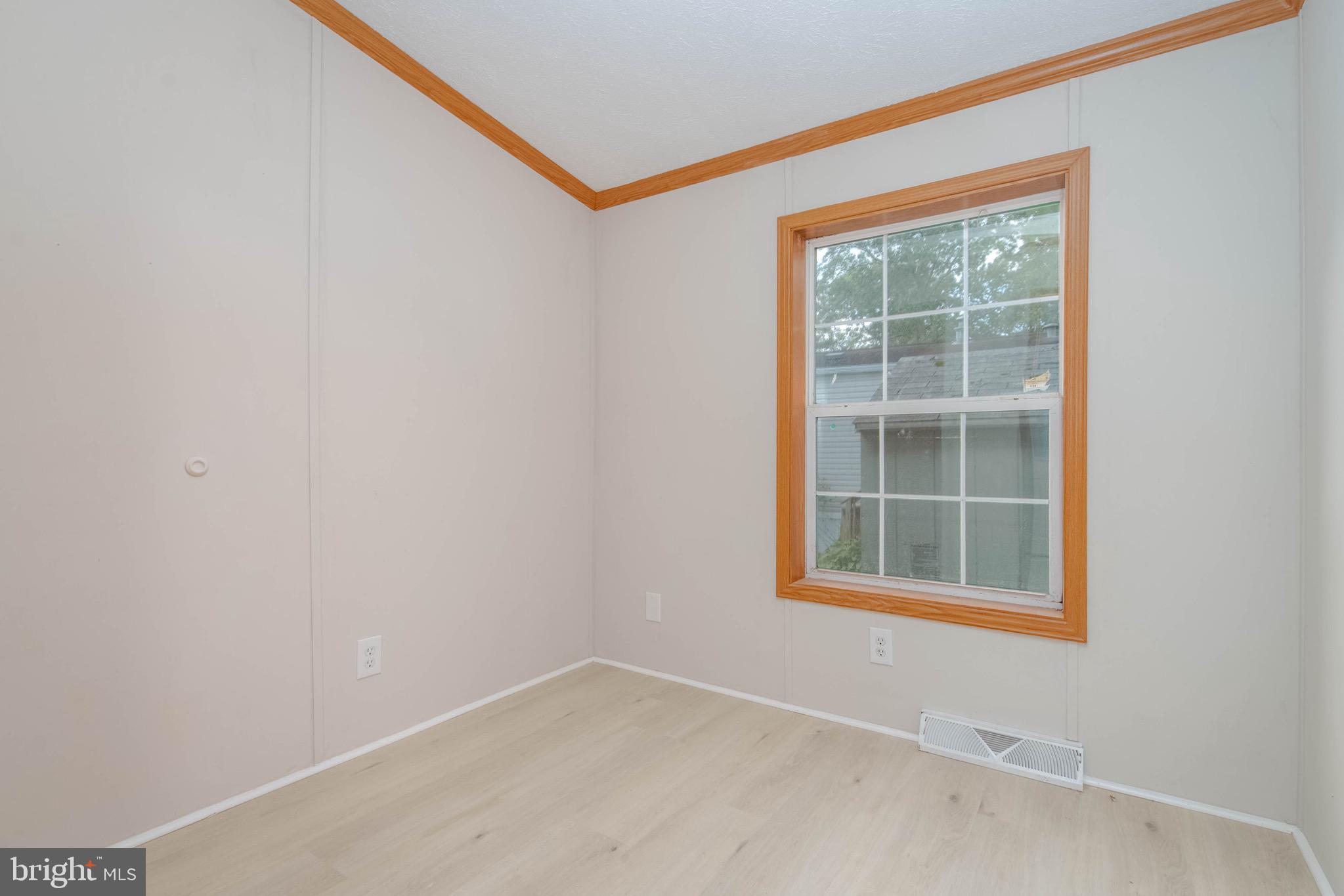 11540 Philadelphia Road White Marsh, MD 21162 - Photo 22 of 32 an empty room with a window