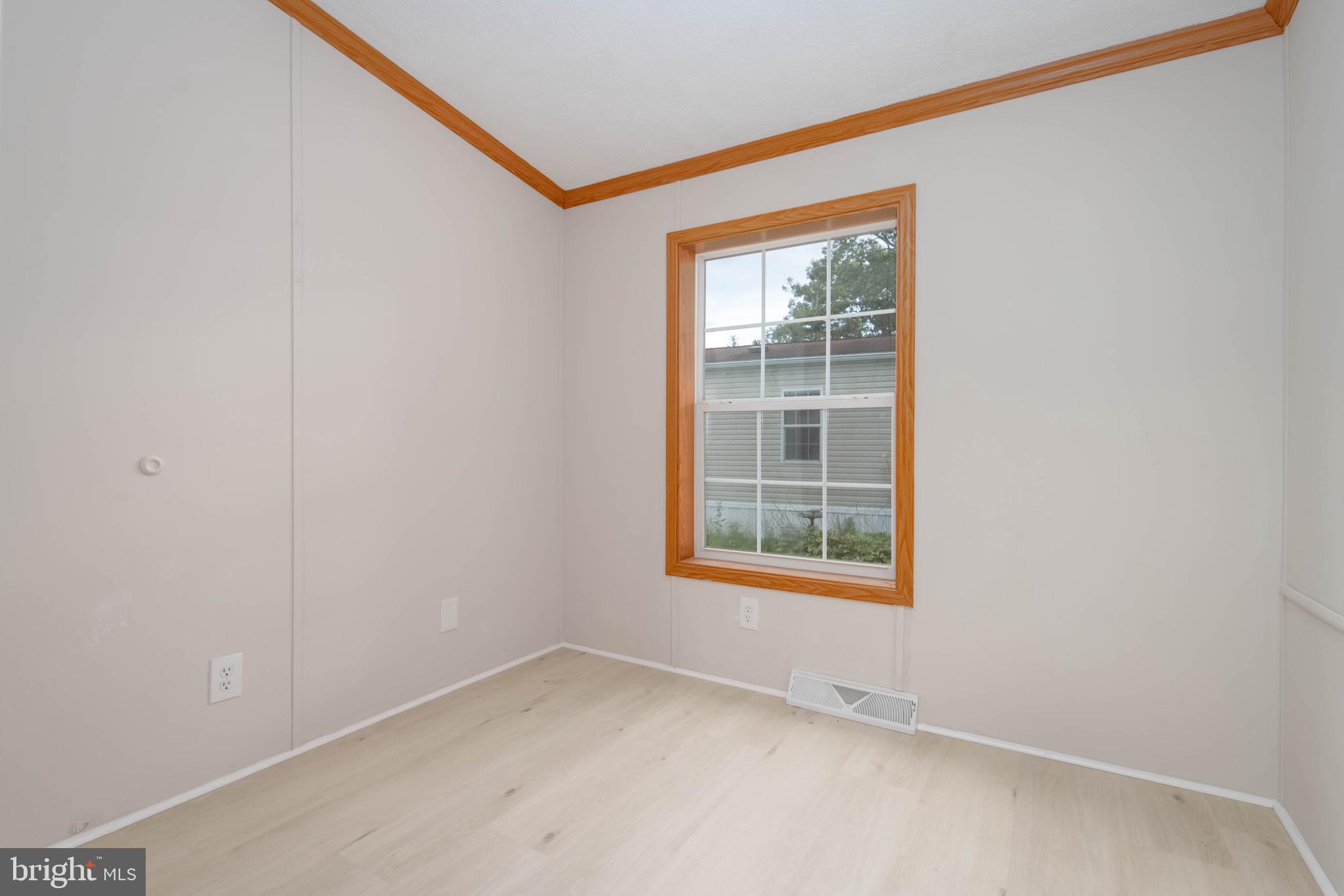 11540 Philadelphia Road White Marsh, MD 21162 - Photo 26 of 32 an empty room with a window