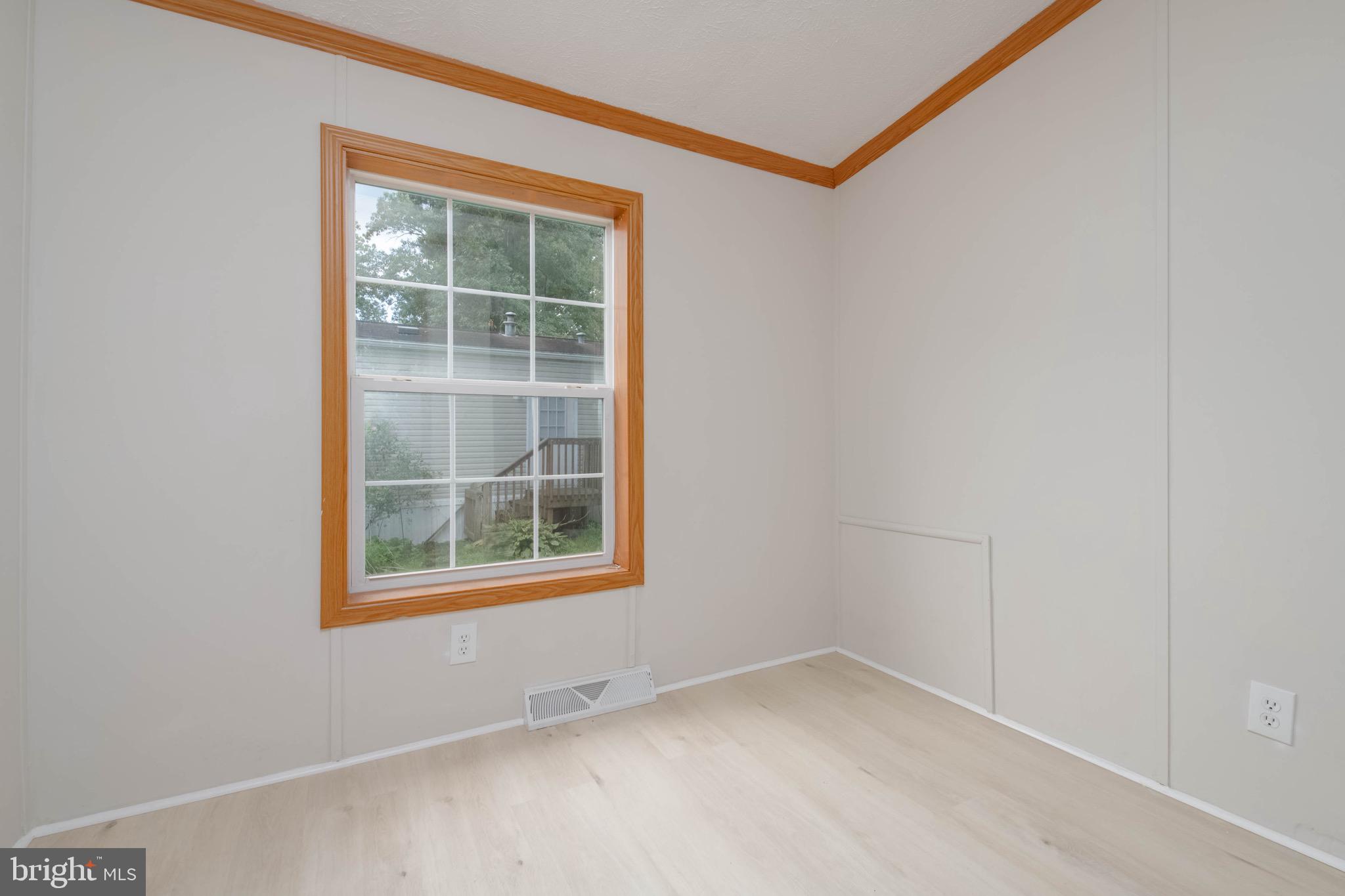 11540 Philadelphia Road White Marsh, MD 21162 - Photo 27 of 32 an empty room with a window