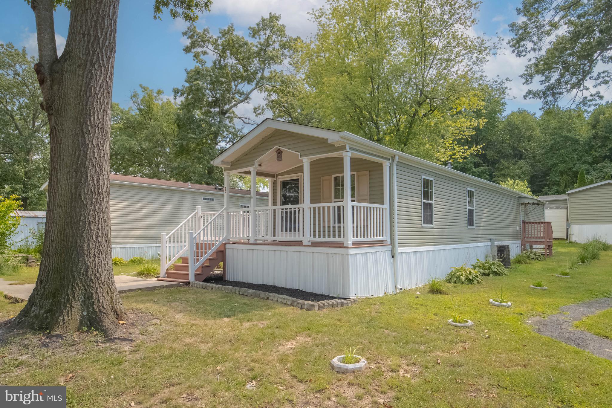 11540 Philadelphia Road White Marsh, MD 21162 - Photo 3 of 32 a view of a house with backyard and trees