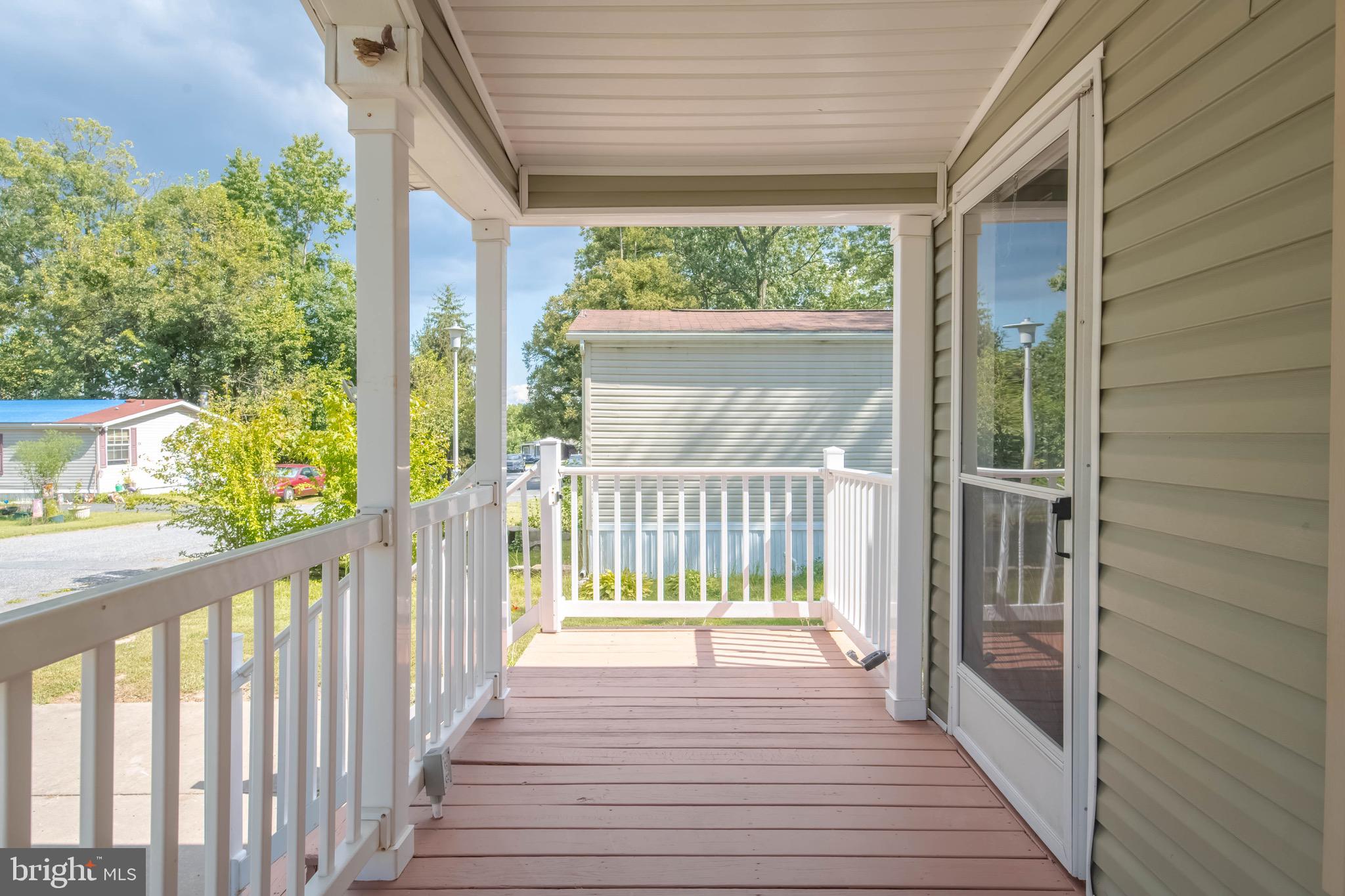 11540 Philadelphia Road White Marsh, MD 21162 - Photo 8 of 32 a view of balcony with wooden floor