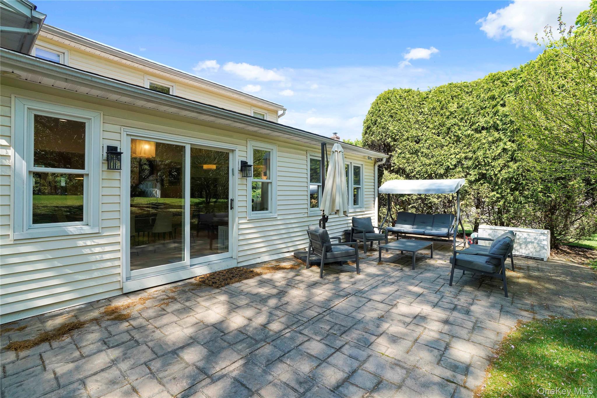 97 Hanson Lane New Rochelle, NY 10804 - Photo 35 of 43 Sliding Glass Door From Dining Area Leads To Patio