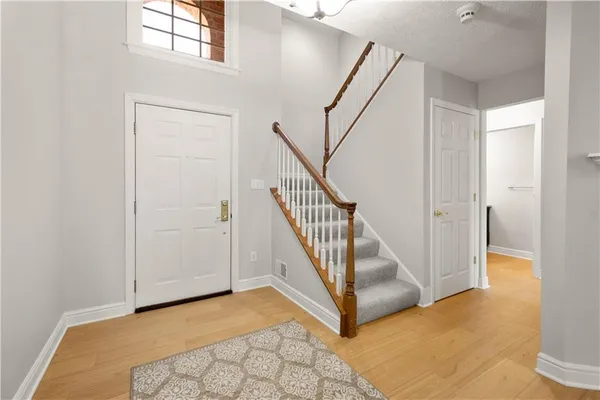 a view of a hallway with staircase