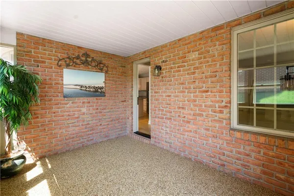 a view of front door of house with window