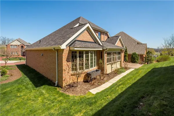 a house view with a garden space