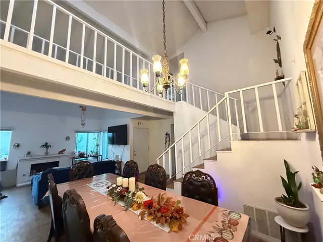 a bathroom with a sink mirror vanity and toilet