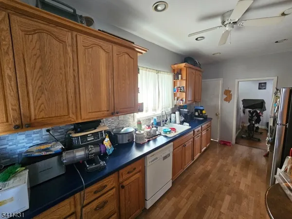 a kitchen with sink cabinets and window