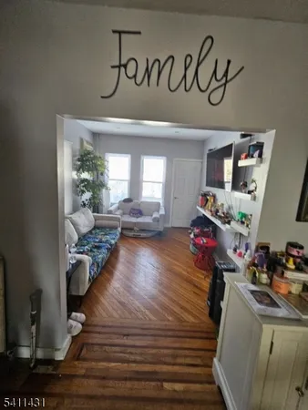 a view of a room with workspace and toys