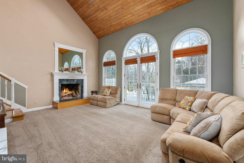 811 Swift Road Pasadena, MD 21122 - Photo 3 of 52 Family Room with Fireplace French Doors