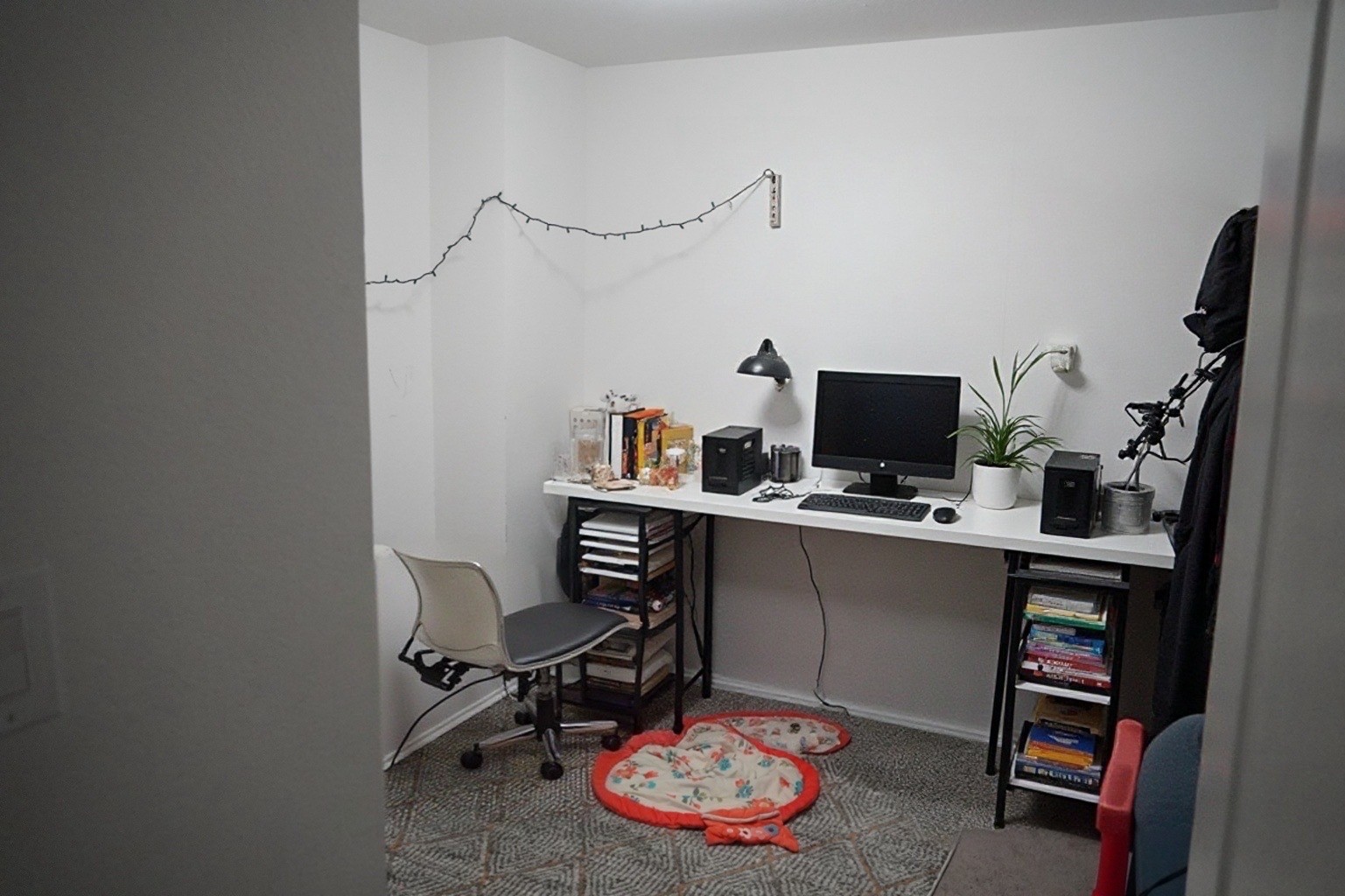 28612 Rantoul Court Point Blank, TX 77364 - Photo 4 of 4 a view of a workspace with furniture and a gate
