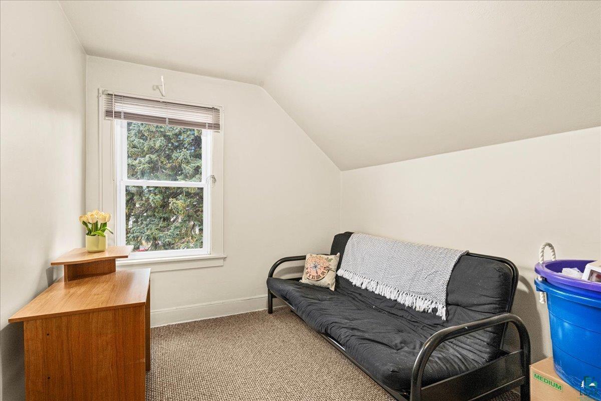 4316 West 6th Street Duluth, MN 55807 - Photo 30 of 39 Sitting room with carpet floors and vaulted ceiling