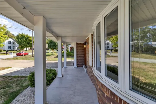 a view of a porch with garden