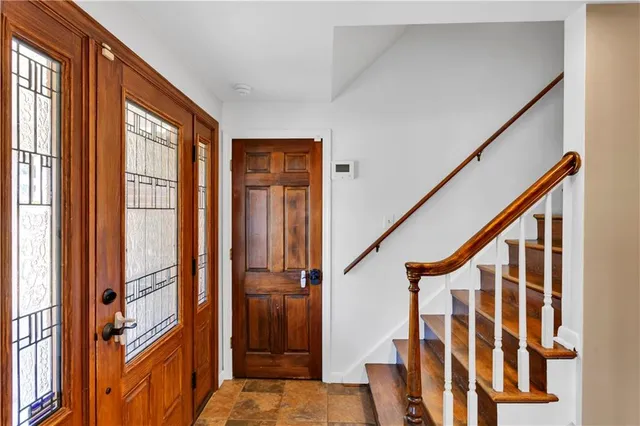 a view of an entryway with staircase