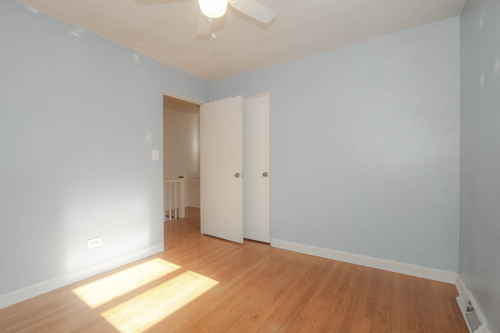 439 Elmhurst Road Mount Prospect, IL 60056 - Photo 16 of 24 an empty room with an empty space and a window