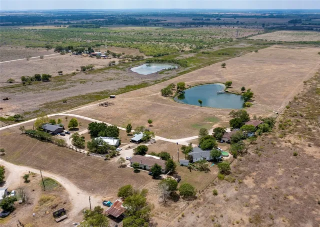 an aerial view of beach and ocean
