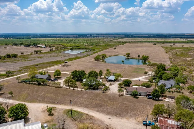 an aerial view of beach and ocean