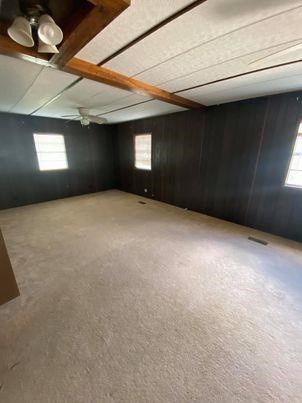 83 Roots Road Martindale, TX 78655 - Photo 9 of 9 a view of an empty room and window