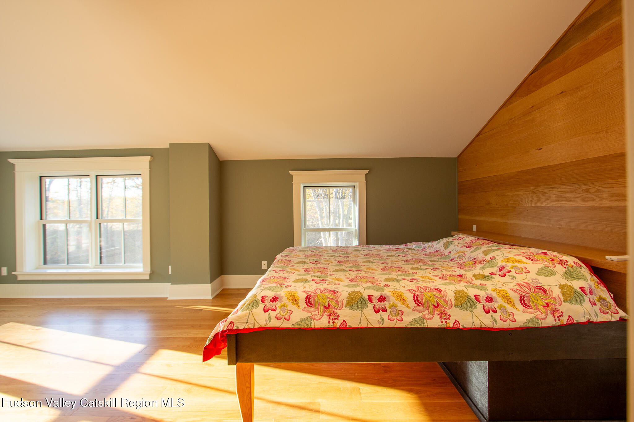 48 Konig Road Ghent, NY 12075 - Photo 12 of 21 a bedroom with a bed and dresser with wooden floor
