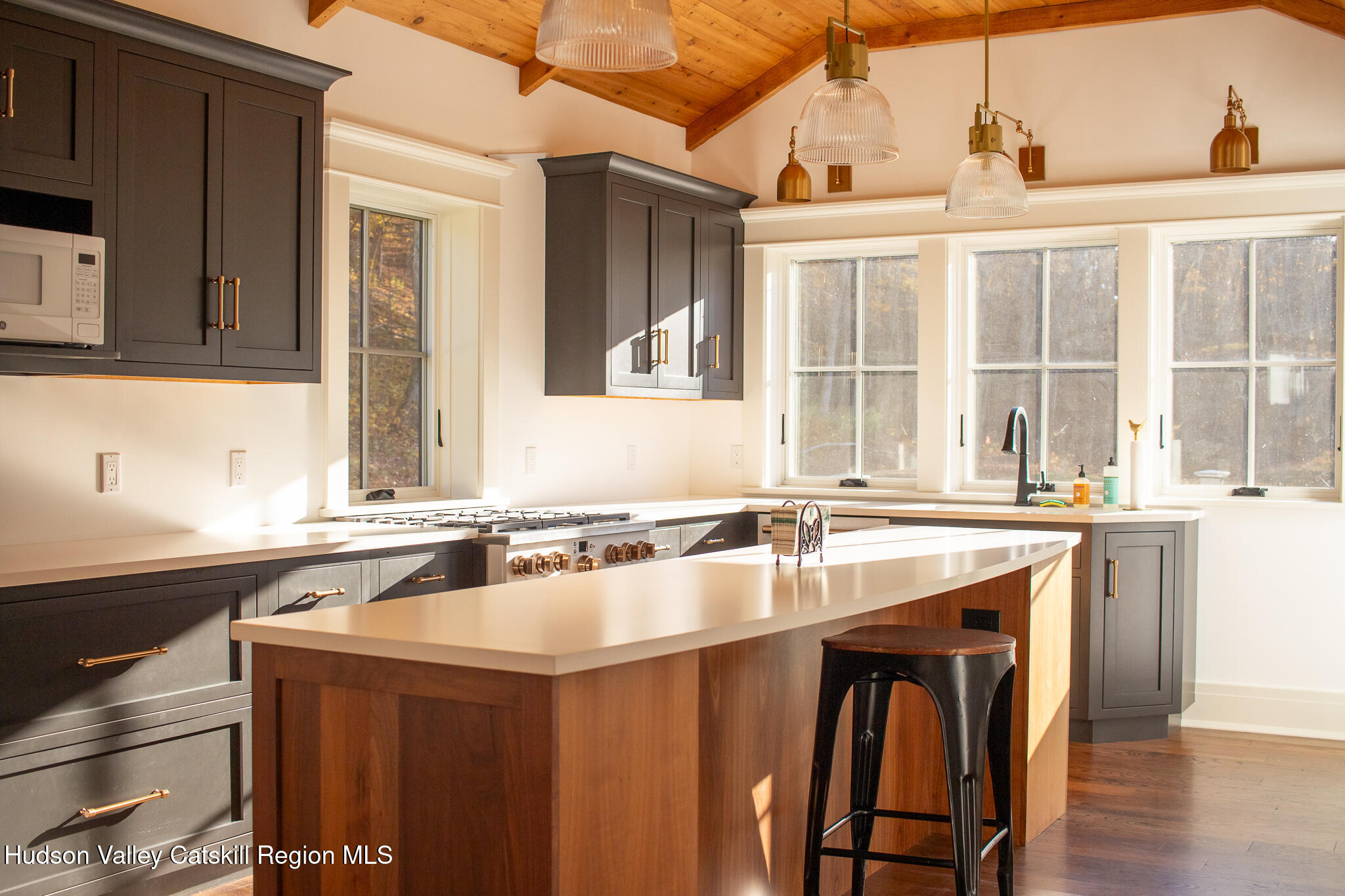 48 Konig Road Ghent, NY 12075 - Photo 6 of 21 a kitchen with a sink stove and cabinets