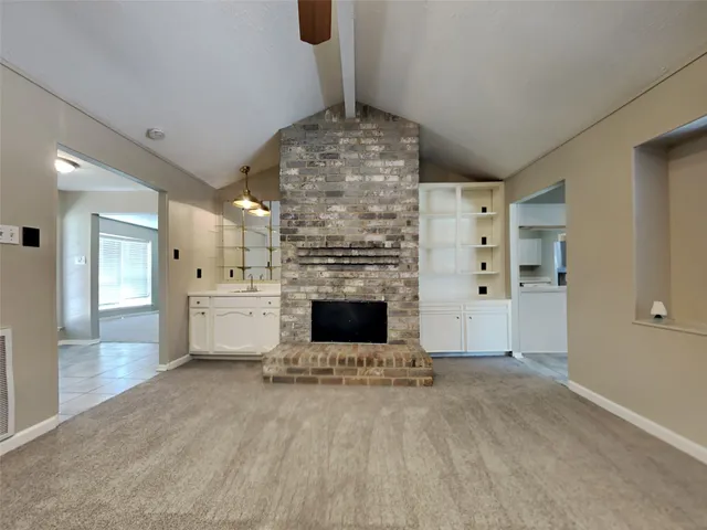 a view of a livingroom with a fireplace