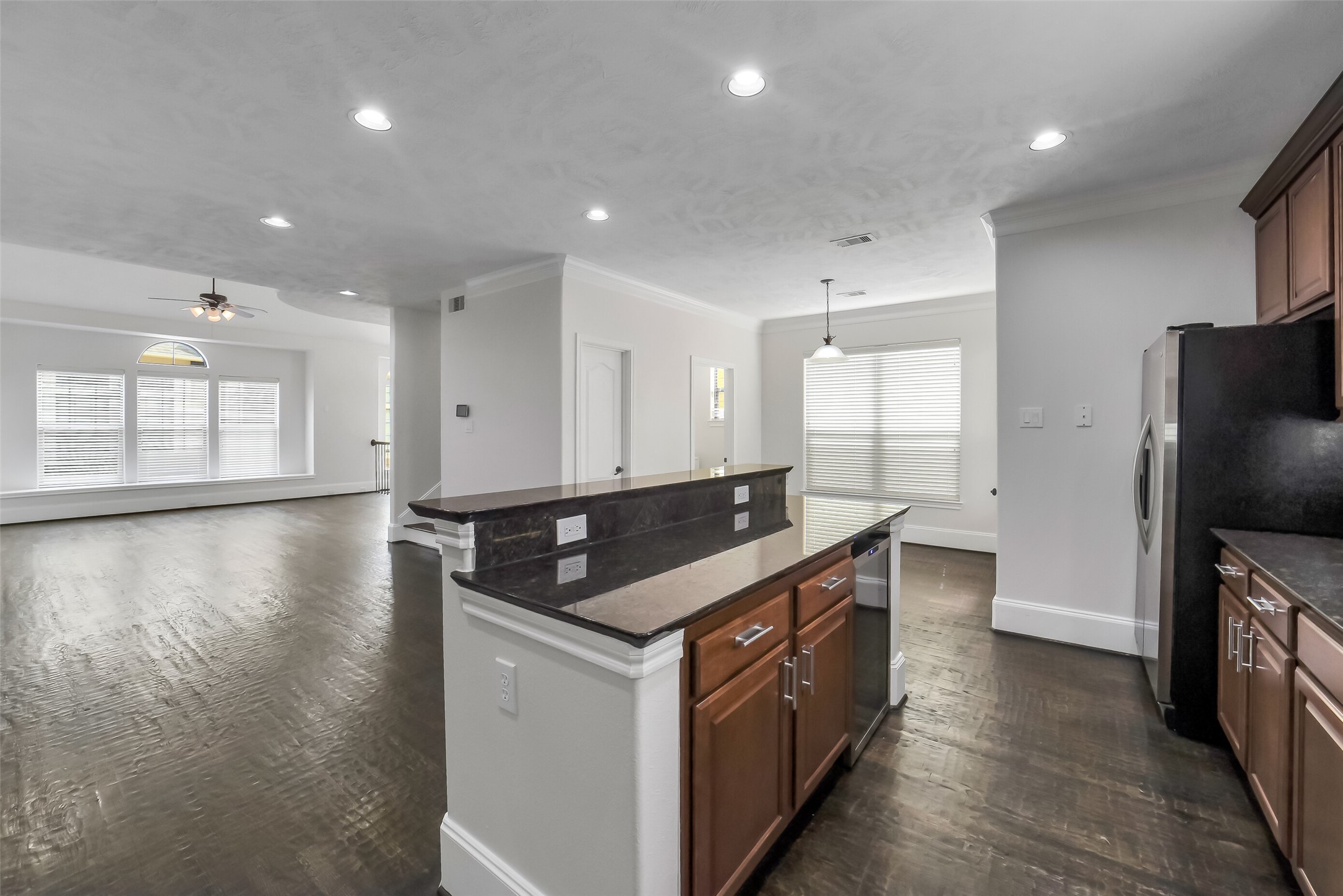 1335 Studer Street Houston, TX 77007 - Photo 11 of 37 a kitchen with stainless steel appliances granite countertop a sink a stove a refrigerator and a microwave