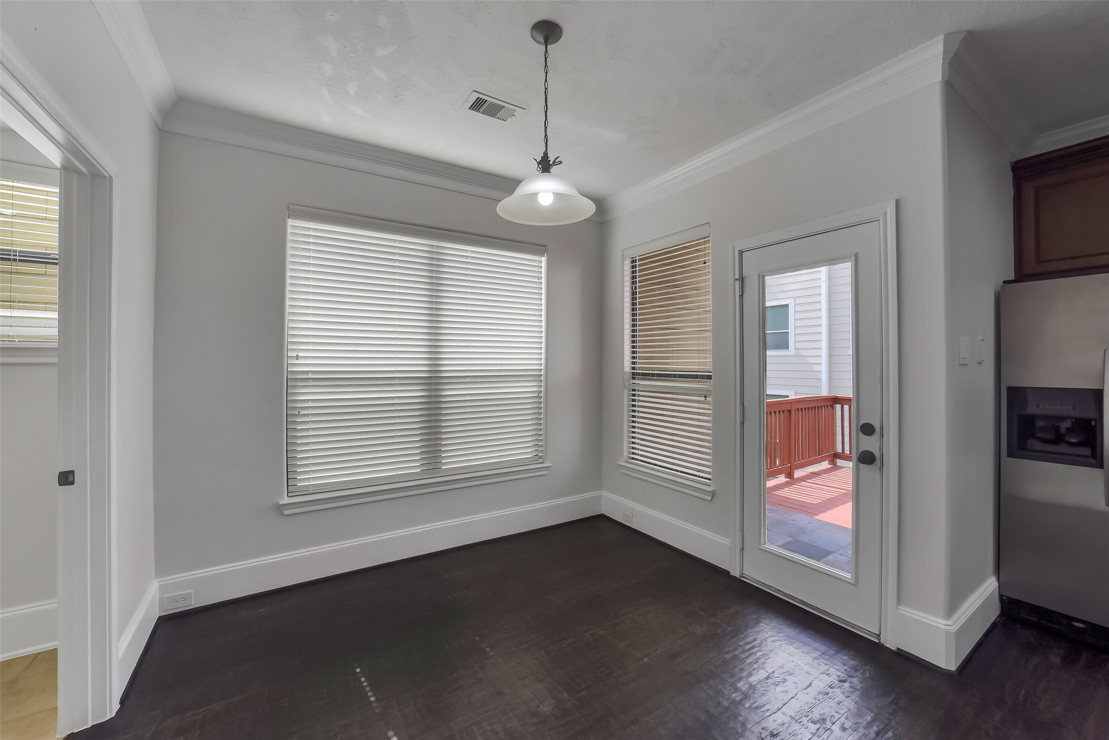 1335 Studer Street Houston, TX 77007 - Photo 15 of 37 a view of livingroom with furniture wooden floor and window