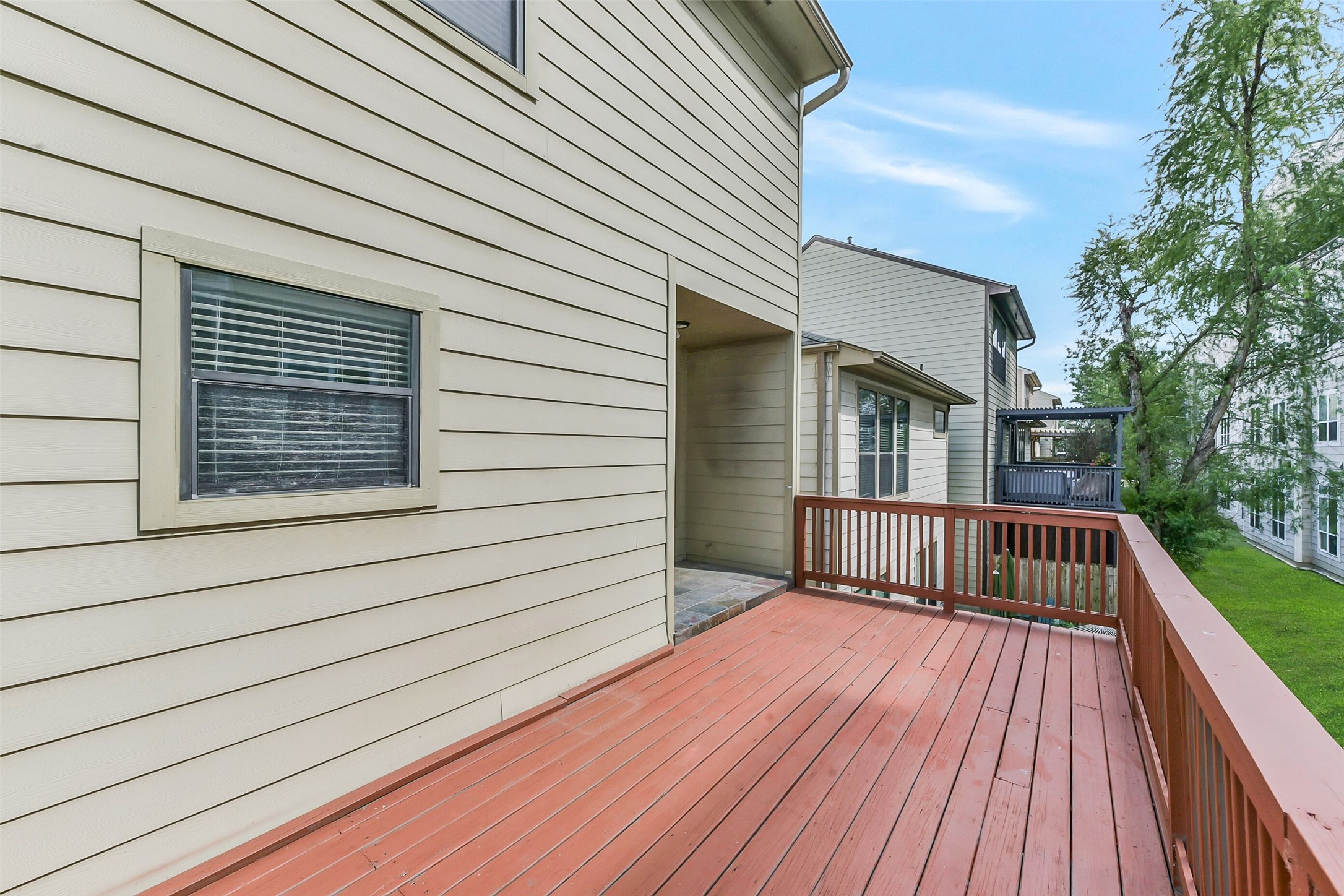 1335 Studer Street Houston, TX 77007 - Photo 35 of 37 a view of backyard with a deck