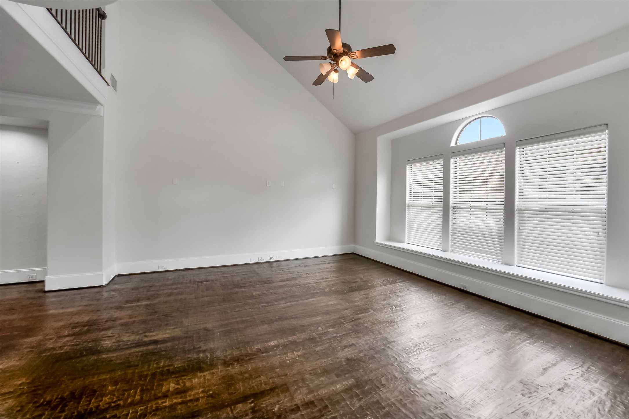 1335 Studer Street Houston, TX 77007 - Photo 6 of 37 wooden floor in an empty room with a window