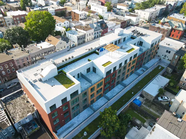 an aerial view of a building with balcony