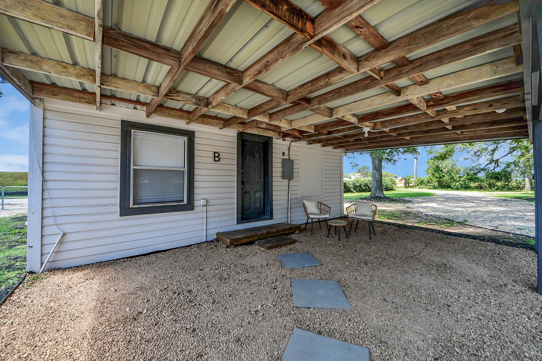 28222 Margerstadt Road Waller, TX 77484 - Photo 19 of 50 Covered outdoor area creates additional workspace and flexibility.