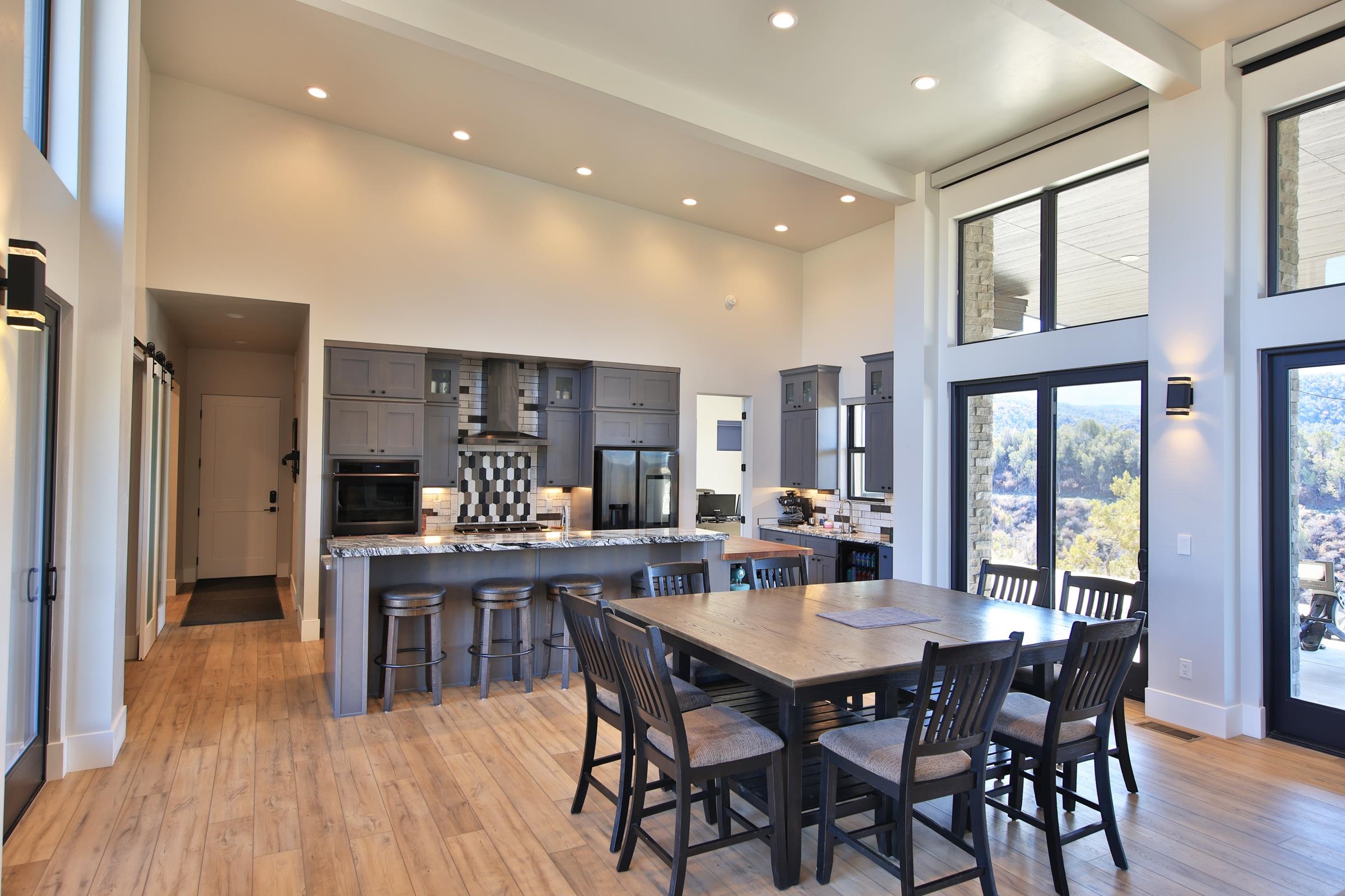 12471-54 54 7/10 Road Molina, CO 81646 - Photo 14 of 39 a view of a dining room with furniture window and wooden floor