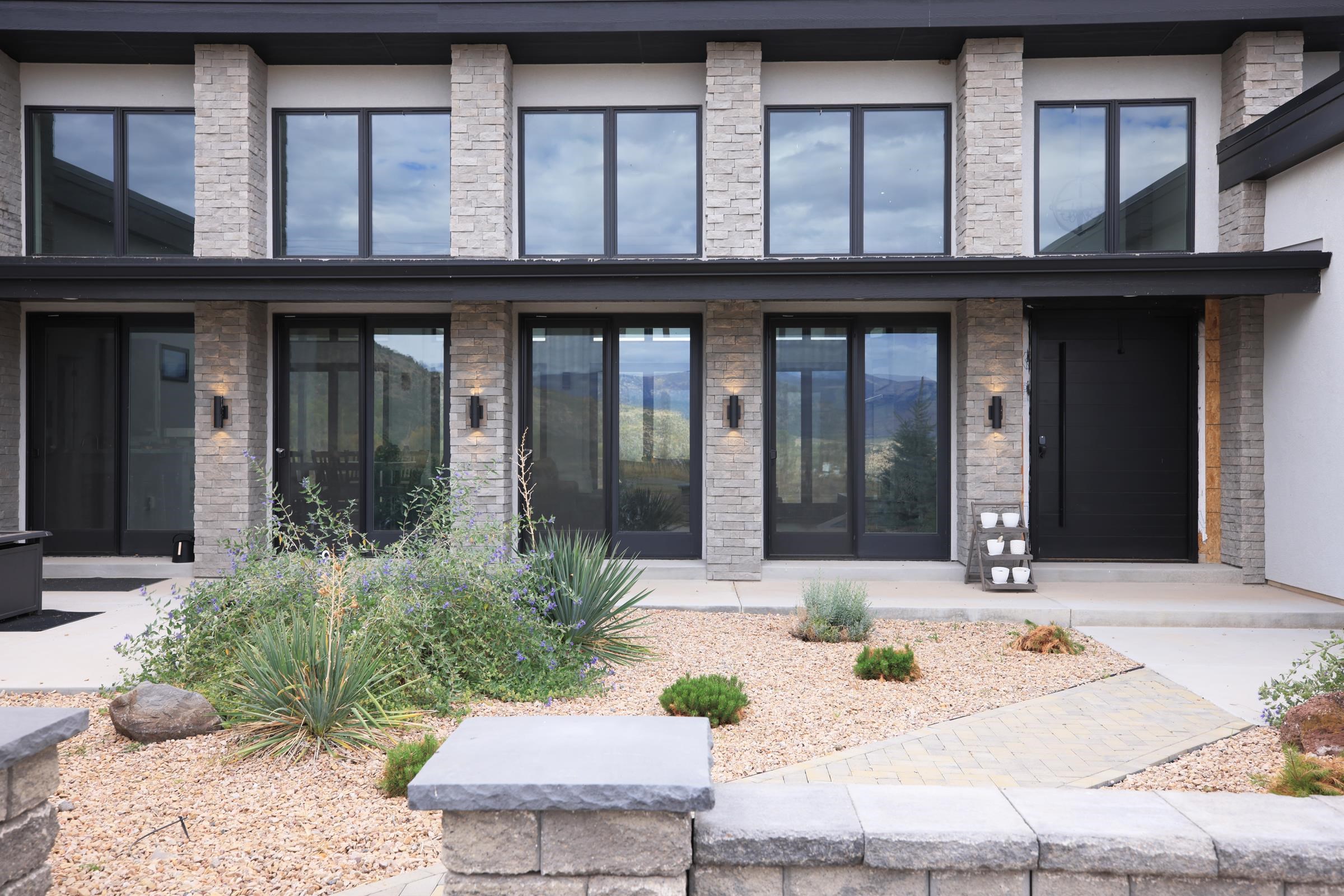 12471-54 54 7/10 Road Molina, CO 81646 - Photo 9 of 39 a view of a building with potted plants