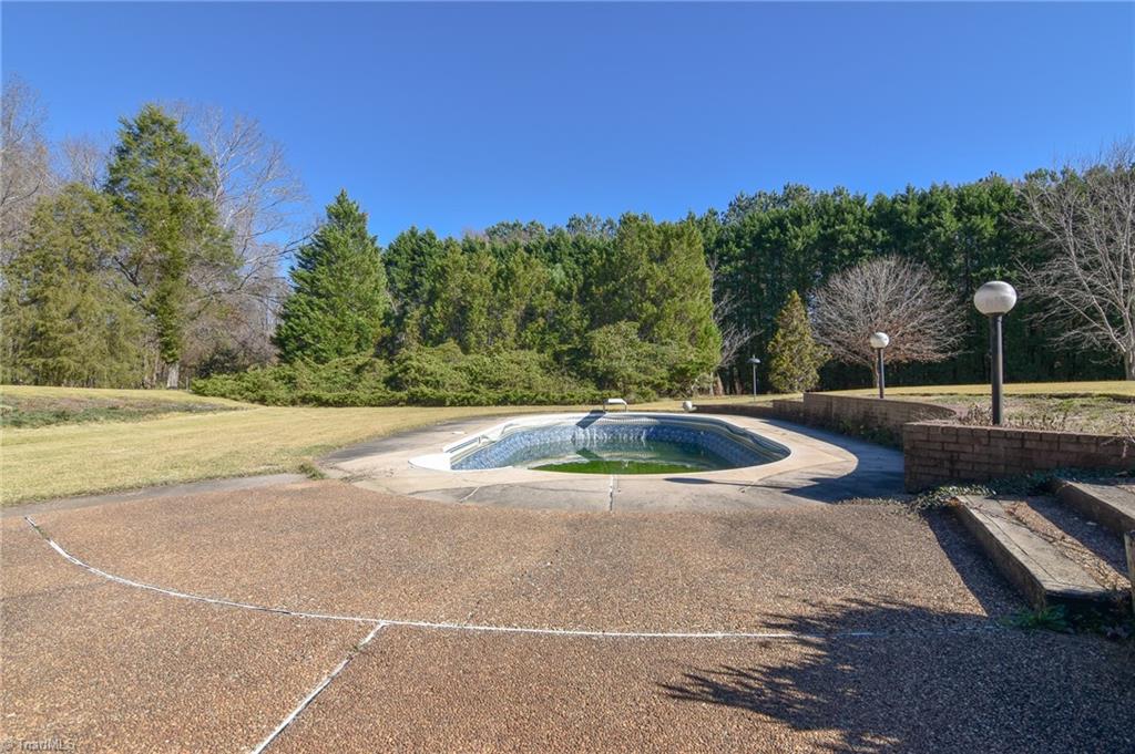 5959 Holder Road Clemmons, NC 27012 - Photo 12 of 40 View from Patio of In-ground Pool and Property