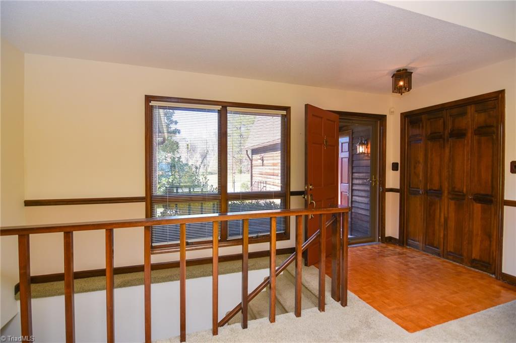 5959 Holder Road Clemmons, NC 27012 - Photo 16 of 40 Front Entry and Staircase to Lower Level