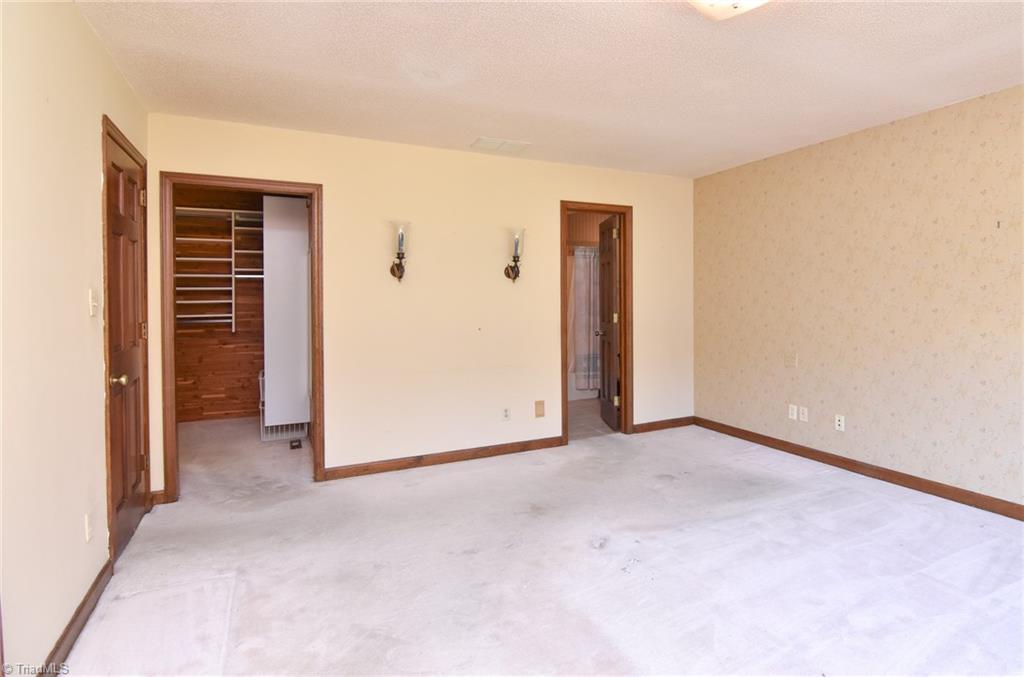 5959 Holder Road Clemmons, NC 27012 - Photo 23 of 40 Master Bedroom with Walk-in Closet
