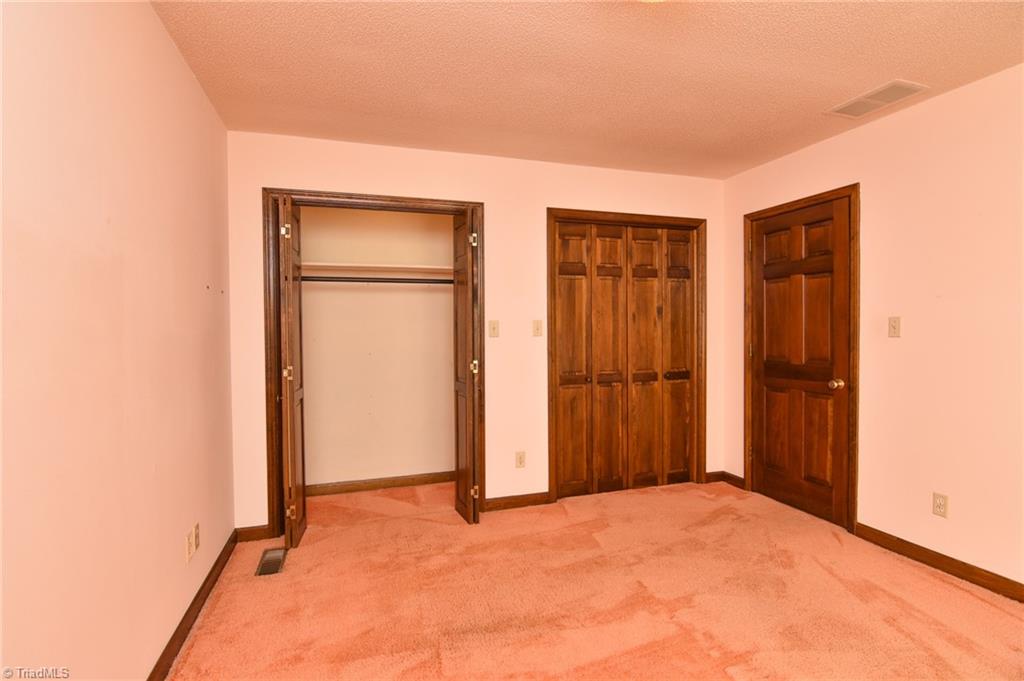 5959 Holder Road Clemmons, NC 27012 - Photo 30 of 40 Guest Bedroom with Double Closets