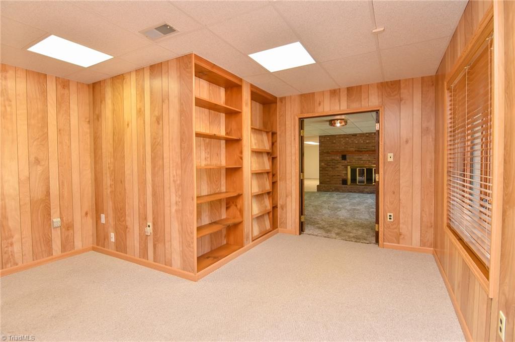 5959 Holder Road Clemmons, NC 27012 - Photo 37 of 40 Lower-Level Office with Built-ins opens to Den