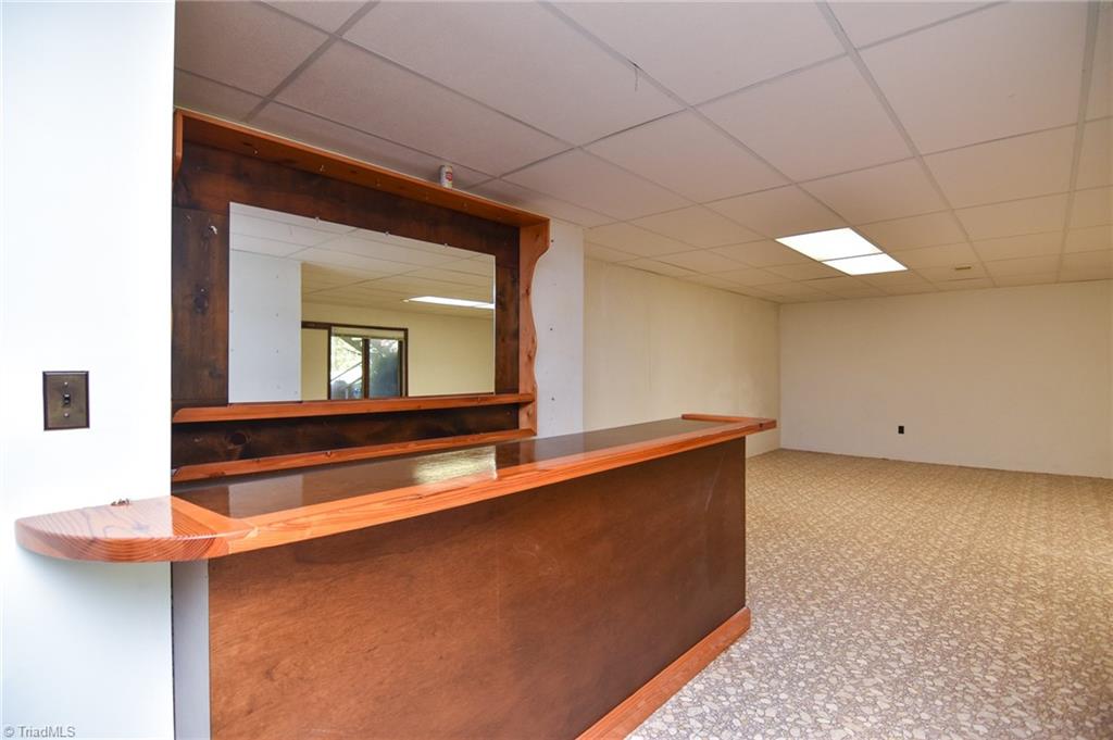 5959 Holder Road Clemmons, NC 27012 - Photo 39 of 40 Wet Bar at entrance to Lower-level Playroom