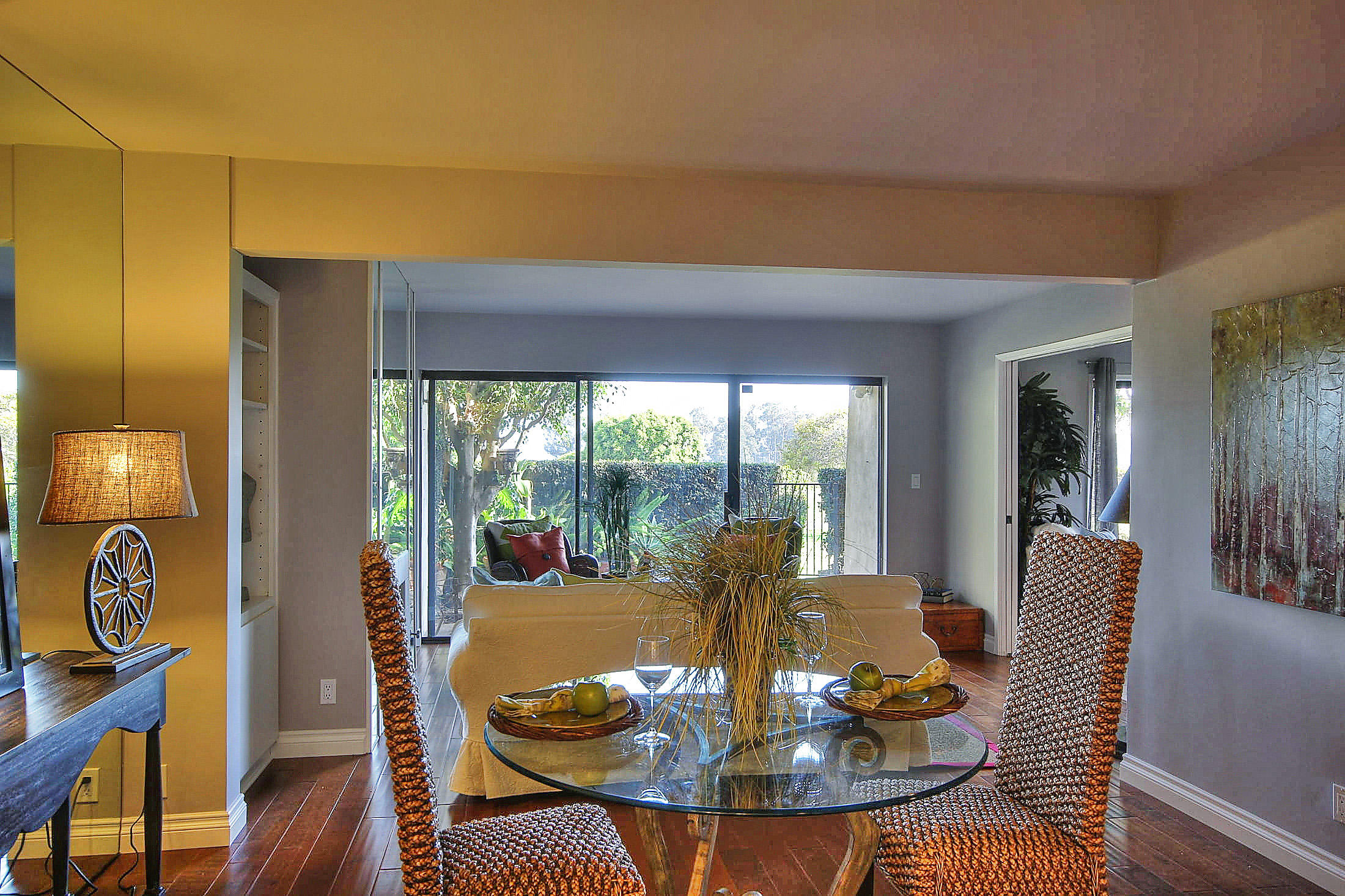 3375 Foothill Road, Unit 1114 AND 1113 Carpinteria, CA 93013 - Photo 22 of 27 a view of a dining room with furniture window and wooden floor