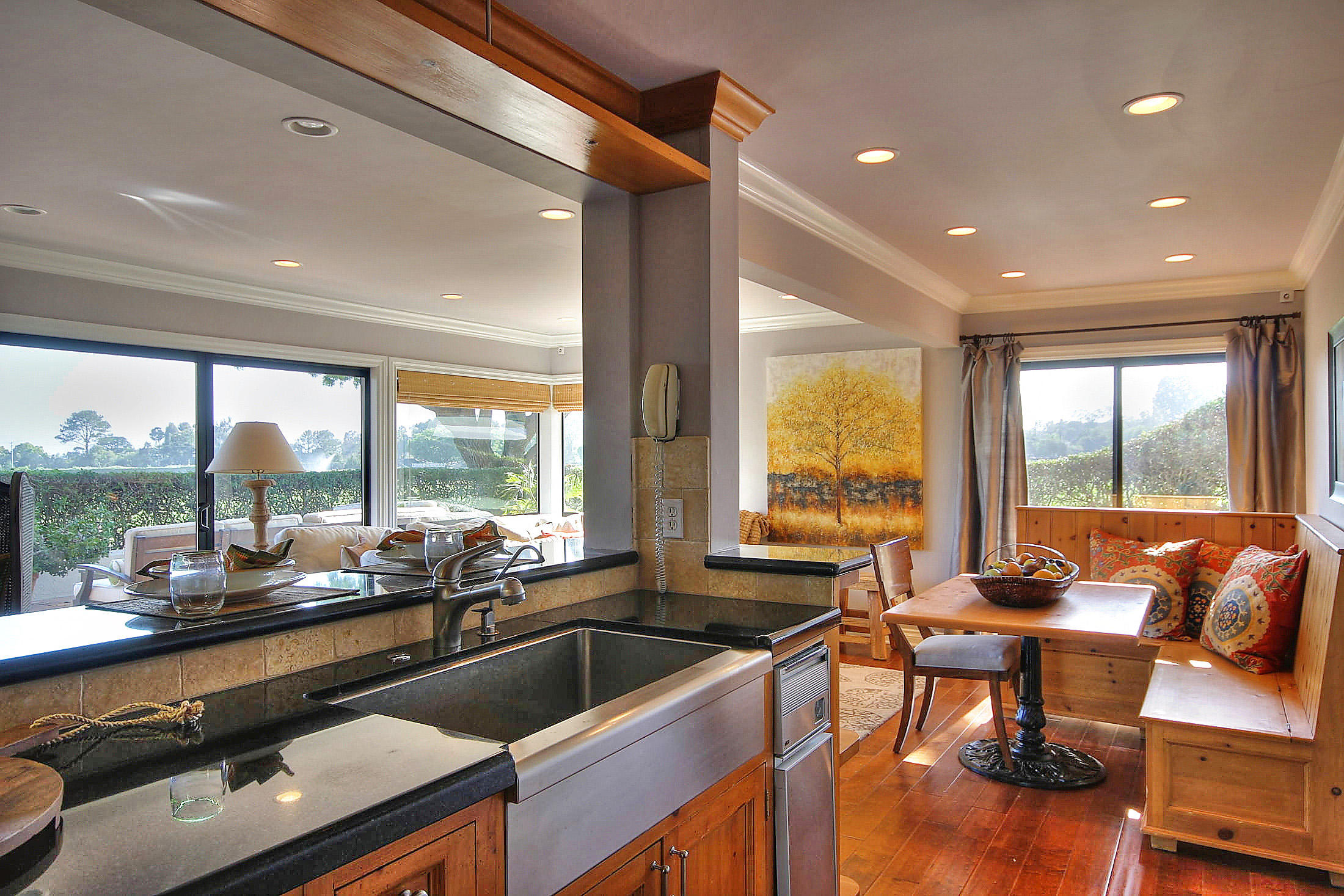 3375 Foothill Road, Unit 1114 AND 1113 Carpinteria, CA 93013 - Photo 5 of 27 a kitchen with a large window and dining table