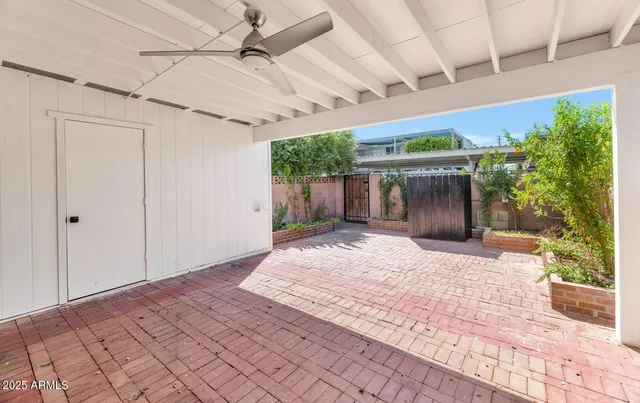 a spacious bathroom with a tub and shower