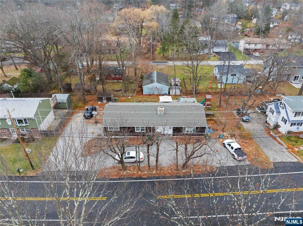 175 Highland Lakes Road Vernon, NJ 07422 - Photo 45 of 50 a view of a swimming pool with outdoor seating