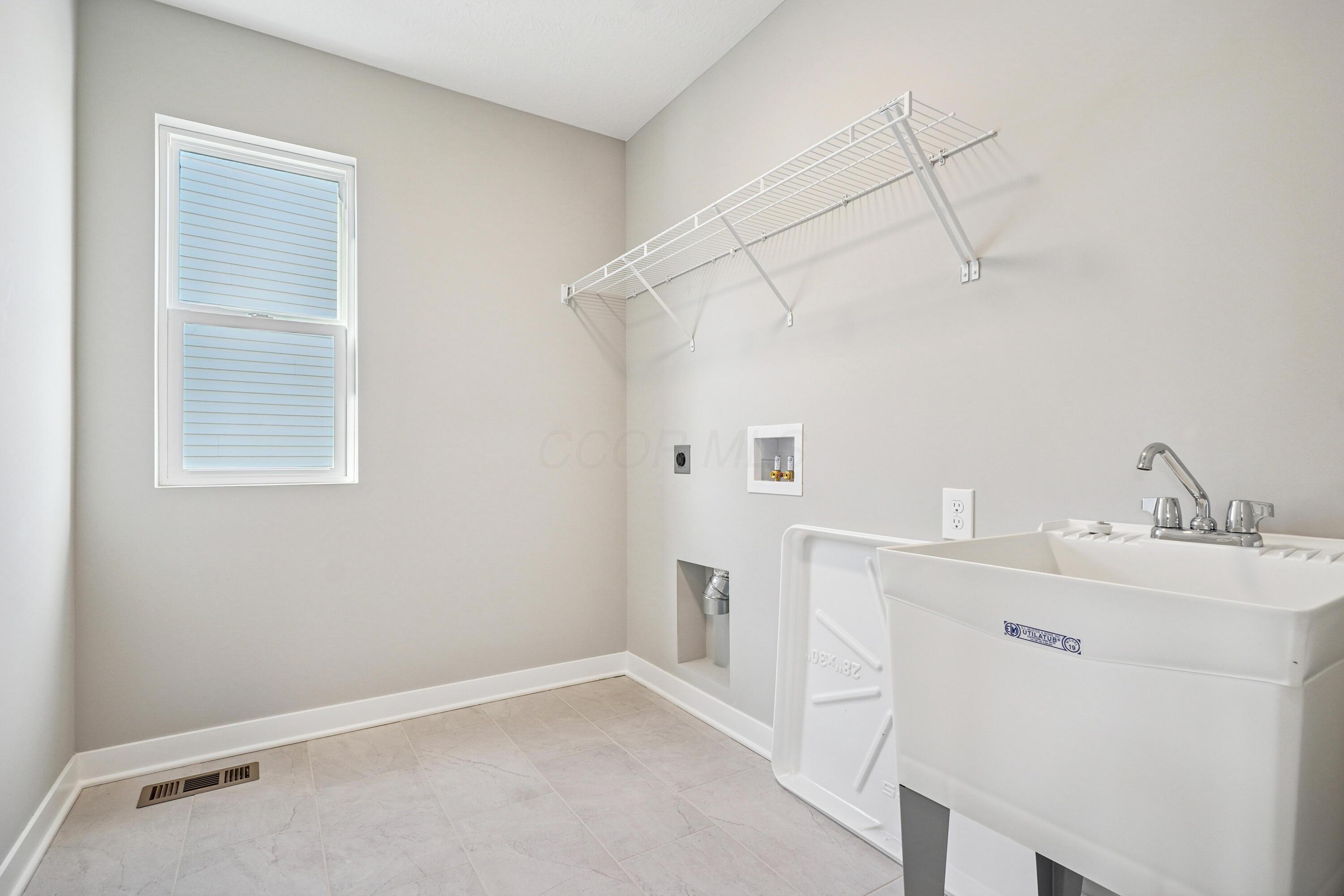 7094 Unitas Loop Powell, OH 43065 - Photo 24 of 42 Laundry Room
