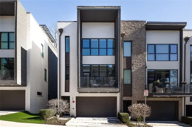 a front view of a house with a porch