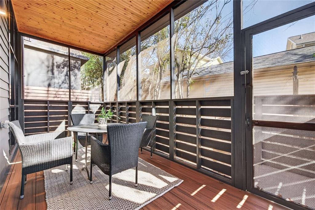 105 Birch Street Decatur, GA 30030 - Photo 11 of 31 a view of balcony with chairs and wooden fence
