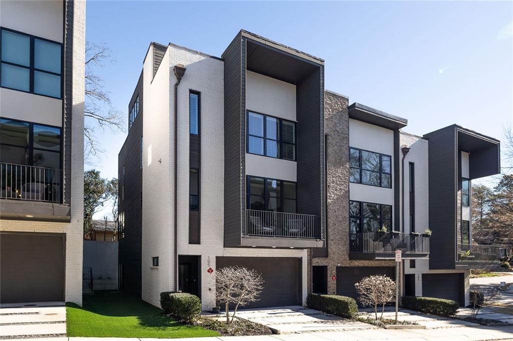 105 Birch Street Decatur, GA 30030 - Photo 2 of 31 a front view of a building with a garden