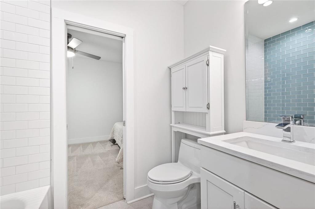 105 Birch Street Decatur, GA 30030 - Photo 28 of 31 a bathroom with a sink toilet vanity and shower