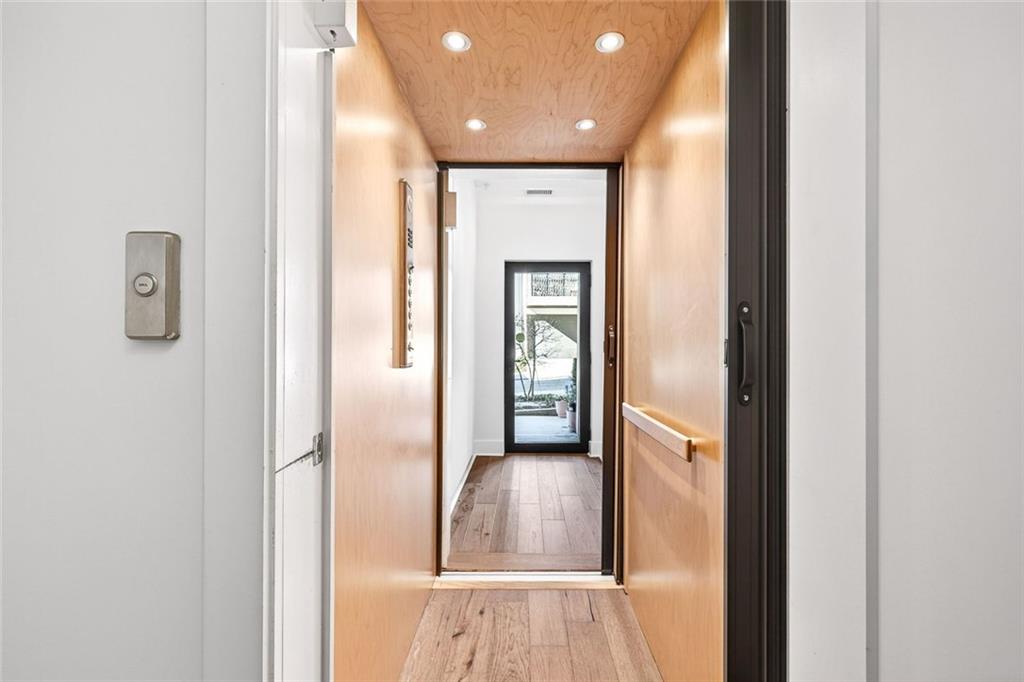 105 Birch Street Decatur, GA 30030 - Photo 30 of 31 a view of hallway with wooden floor